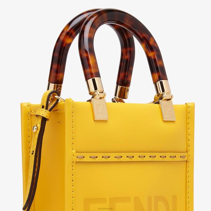 ženske usnjena mini torbica sunshine shopper rumena Fendi dodatki Z68L885